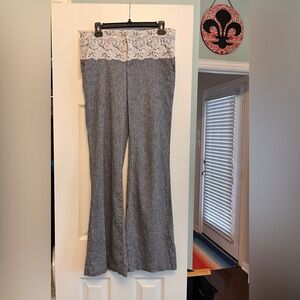 Anthropologie lace top slightly flare pants.  No visible wear.